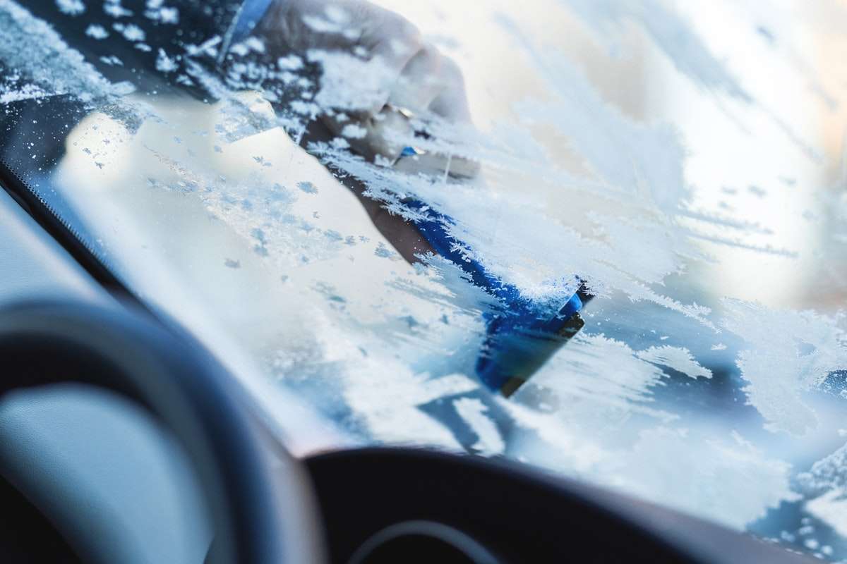 removing snow from windshield